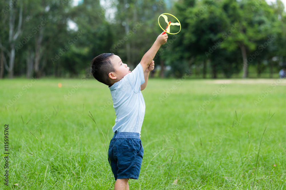 Little boy play his toy at outdoor Little boy play his toy at outdoor