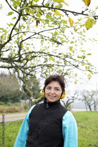 Sweden, Skane, Degeberga, Portrait of farmer wearing ear protectors photo