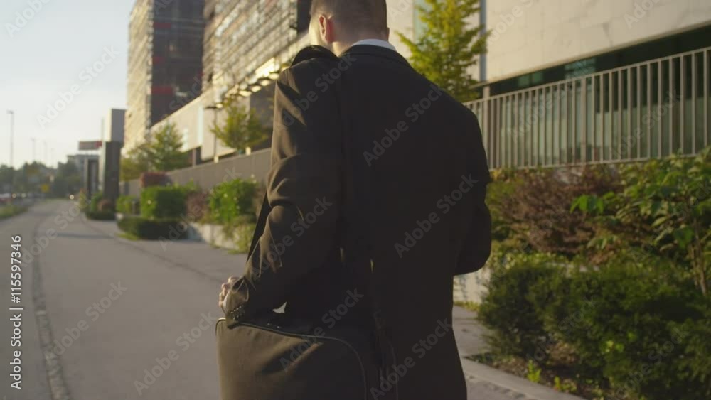 CLOSE UP: Businessman going to work to the business district CLOSE UP: Businessman going to work to the business district
