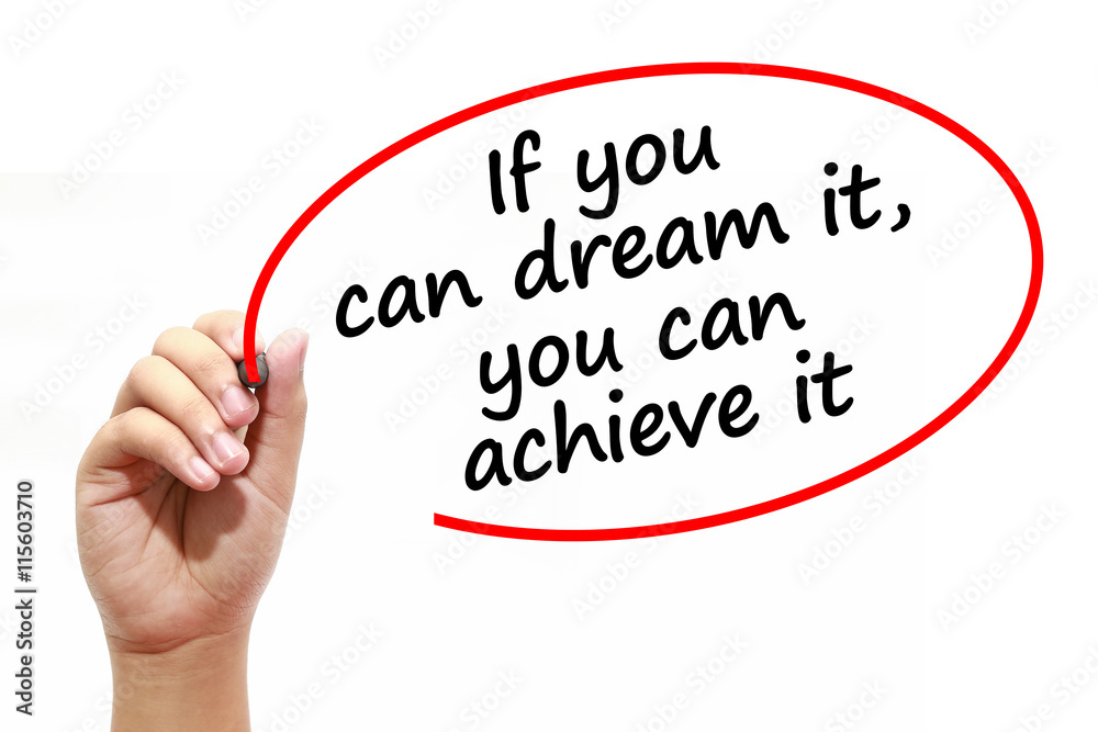 Man writing If you can dream it,you can achieve it with marker on transparent wipe board. Man writing If you can dream it,you can achieve it with marker on transparent wipe board.