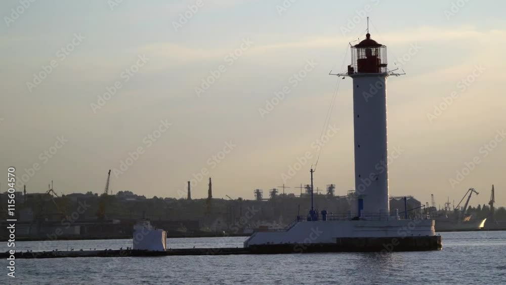 Lighthouse which we see floating on the sea with the ship Lighthouse which we see floating on the sea with the ship