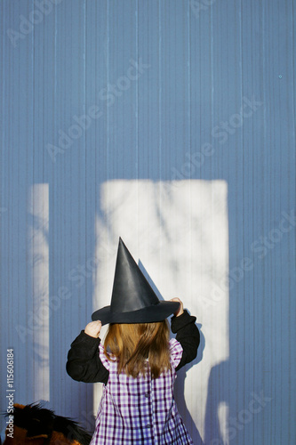 Girl (4-5) wearing costume of witch at Eastertime photo