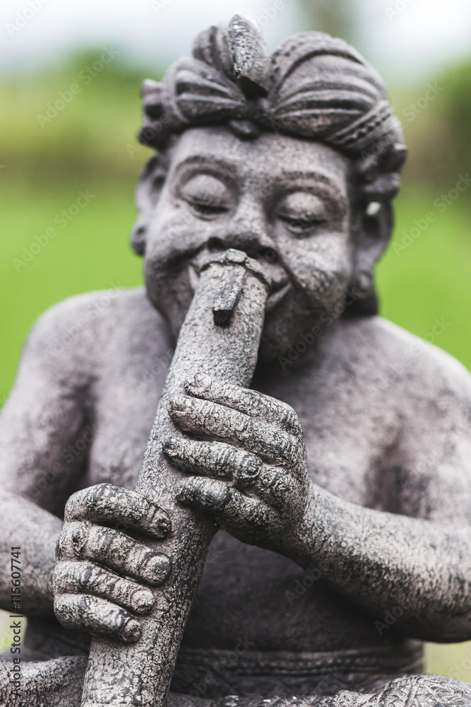 Fototapeta premium Statuette of a Buddhist god Bali