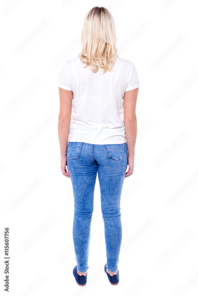 Back view of standing young beautiful woman. Back view of standing young beautiful woman.
