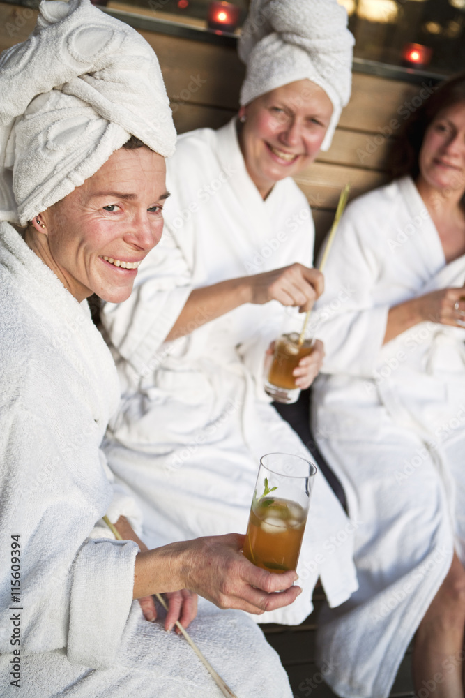 Sweden, Stockholm, Nacka, Terrassvagen 1, Women relaxing in sauna Sweden, Stockholm, Nacka, Terrassvagen 1, Women relaxing in sauna