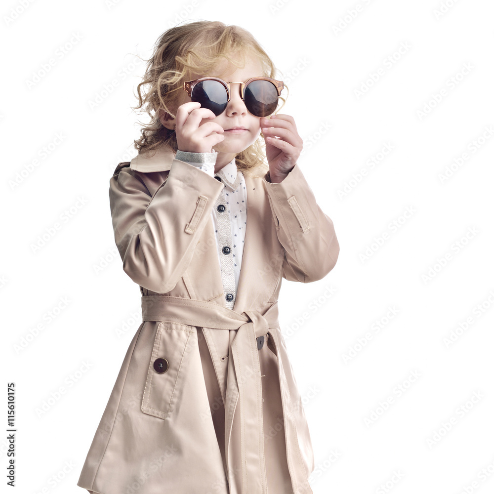 Fashionable child. Girl blonde with glasses Fashionable child. Girl blonde with glasses