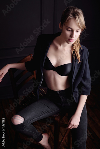 High fashion look. glamor portrait of beautiful sexy stylish young girl model in black