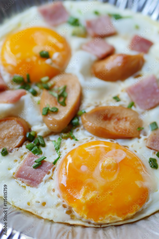 pan egg with ham and sausages pan egg with ham and sausages