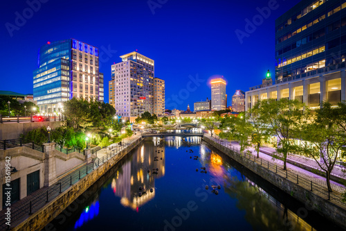 The Providence River and modern buildings at night, in downtown