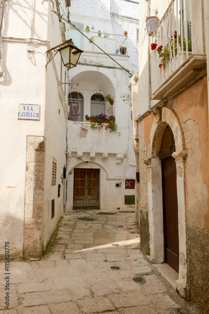 Narrow alley of Cisternino in Puglia