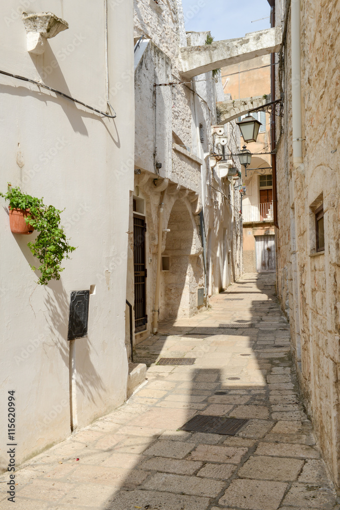Narrow alley of Cisternino in Puglia