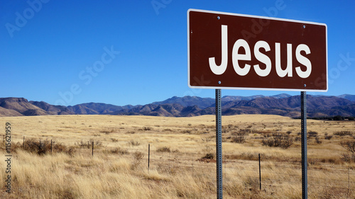 Jesus brown road sign