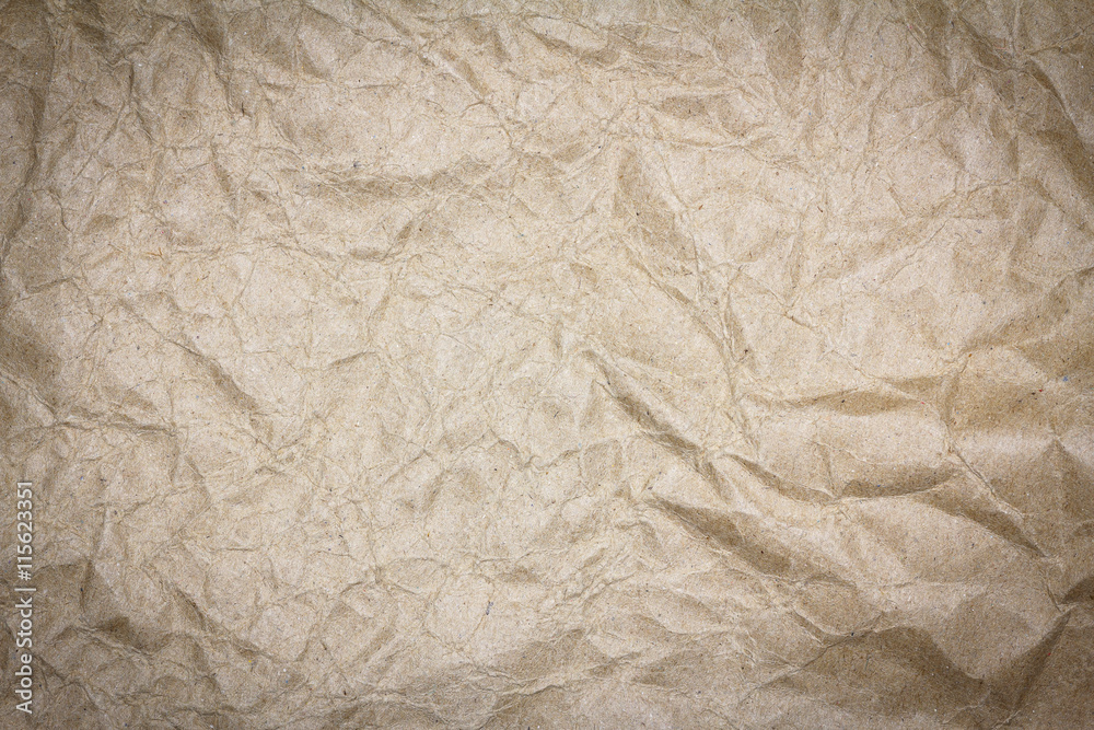 Closeup brown recycled crumpled paper texture. Brown recycled crumpled paper background with copy space for text or image. Dark edged. Closeup brown recycled crumpled paper texture. Brown recycled crumpled paper background with copy space for text or image. Dark edged.