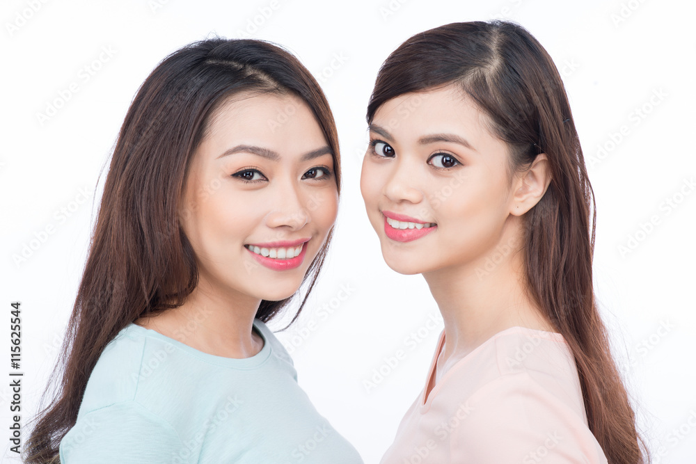 Two happy young female friends. Asian girls laughing. Two happy young female friends. Asian girls laughing.