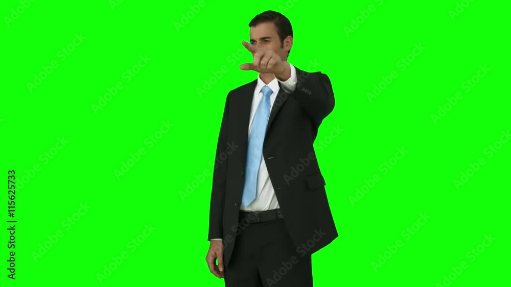 Businessman pointing something with his finger Businessman pointing something with his finger
