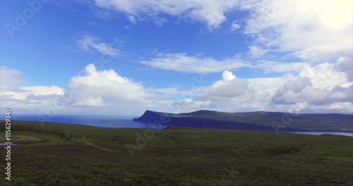 Panoramic views over Oisgill Bay, Loch Pooltiel, Ben Skriaig & Ben Ettow before settling on the small village of Glendale near Dunvegan on the Isle of Skye, Scotland. UK. photo