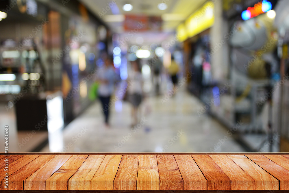 Wood table background with shopping indoor