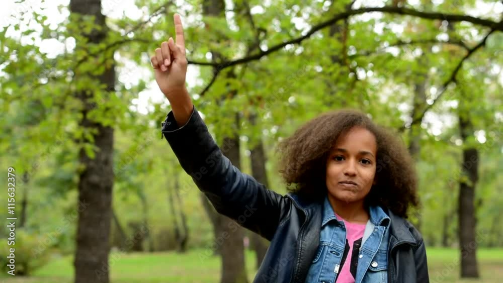 young charming smart african girl raise her up to the sky and shake with her - come foward - knowledge - eye contact young charming smart african girl raise her up to the sky and shake with her - come foward - knowledge - eye contact