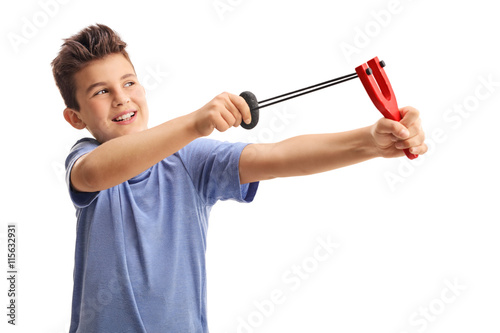 Fotografi Cheerful kid shooting with a slingshot