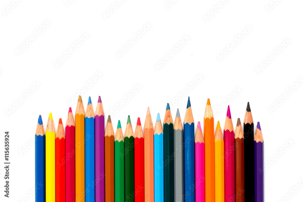 Row of color pencil placed on white background Row of color pencil placed on white background