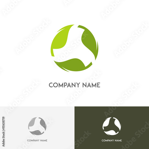 Nature logo - fresh green leaves in circle on the white background