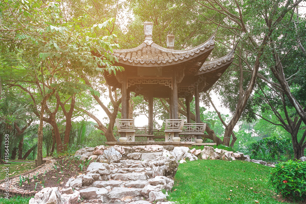 Chinese pavilion with a pleasant atmosphere.Covered with green trees Chinese pavilion with a pleasant atmosphere.Covered with green trees