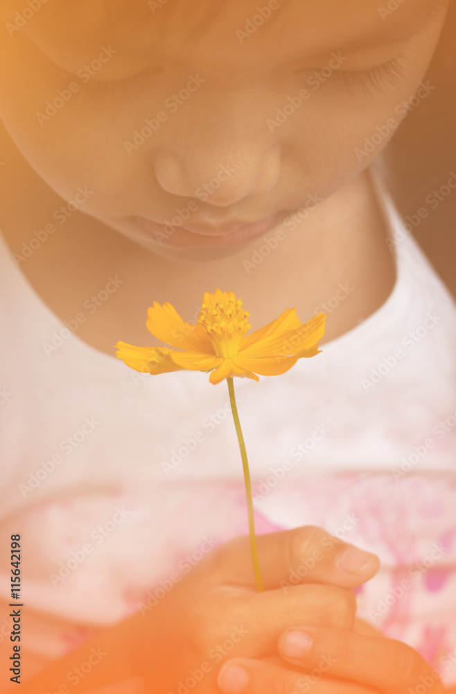 Young girl with flowers, feel good.