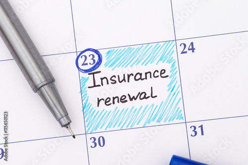 Reminder Insurance Renewal in calendar with pen