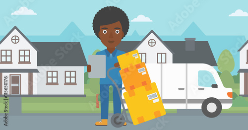 Delivery woman with cardboard boxes.