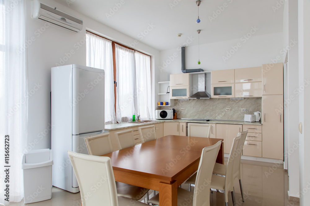 Modern kitchen interior with dinning room. Interior photography.