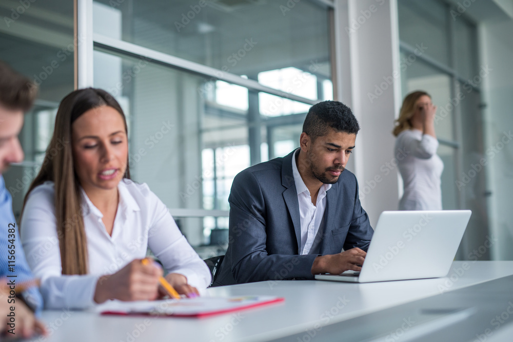 Busy coworkers in an office