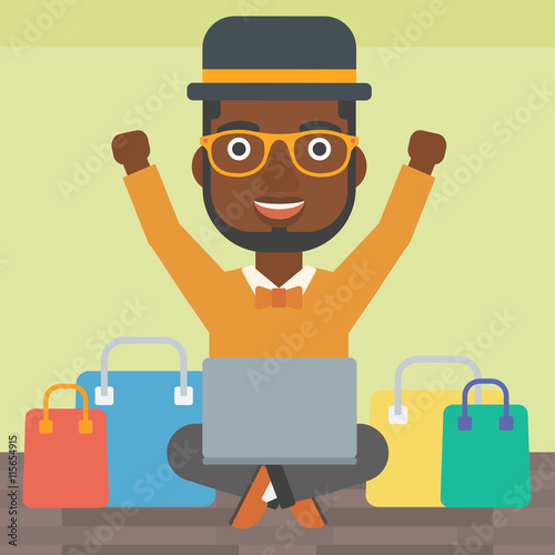 Man shopping online using his laptop.