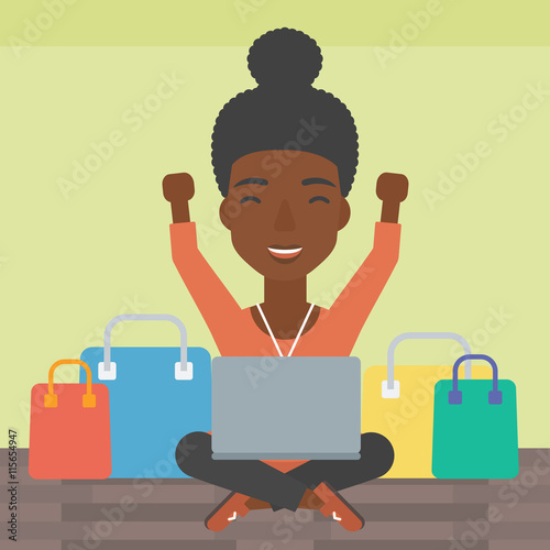 Woman shopping online using her laptop.