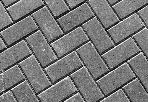 Horizontal vivid black and white street pavement textured backgr