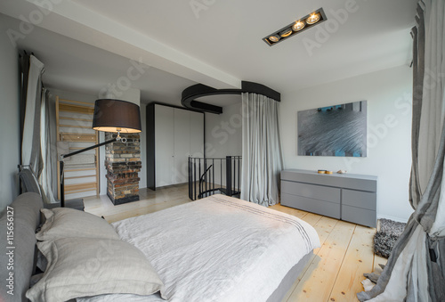 Fototapeta Naklejka Na Ścianę i Meble -  Bedroom in a modern house. Modern interior in private flat.