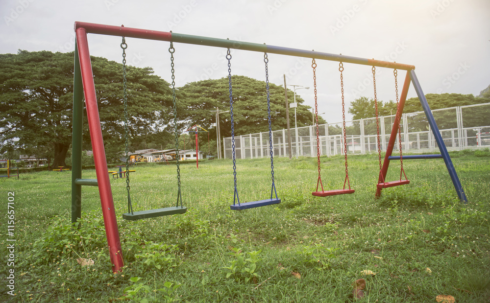 Fototapeta premium playground of children and young in a park,selective focus,filtered image,light effect added