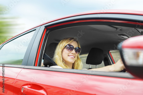 Woman in the car.