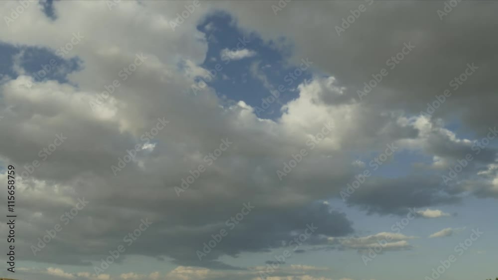 Time lapse of beautiful white clouds over a blue sky Time lapse of beautiful white clouds over a blue sky