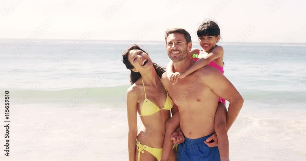 Cute family on holidays at the beach Cute family on holidays at the beach