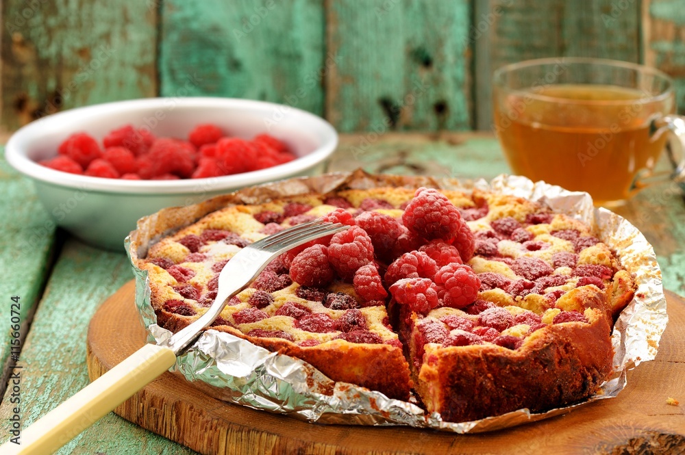 Homemade quark pie with raspberries baked in foil served Homemade quark pie with raspberries baked in foil served