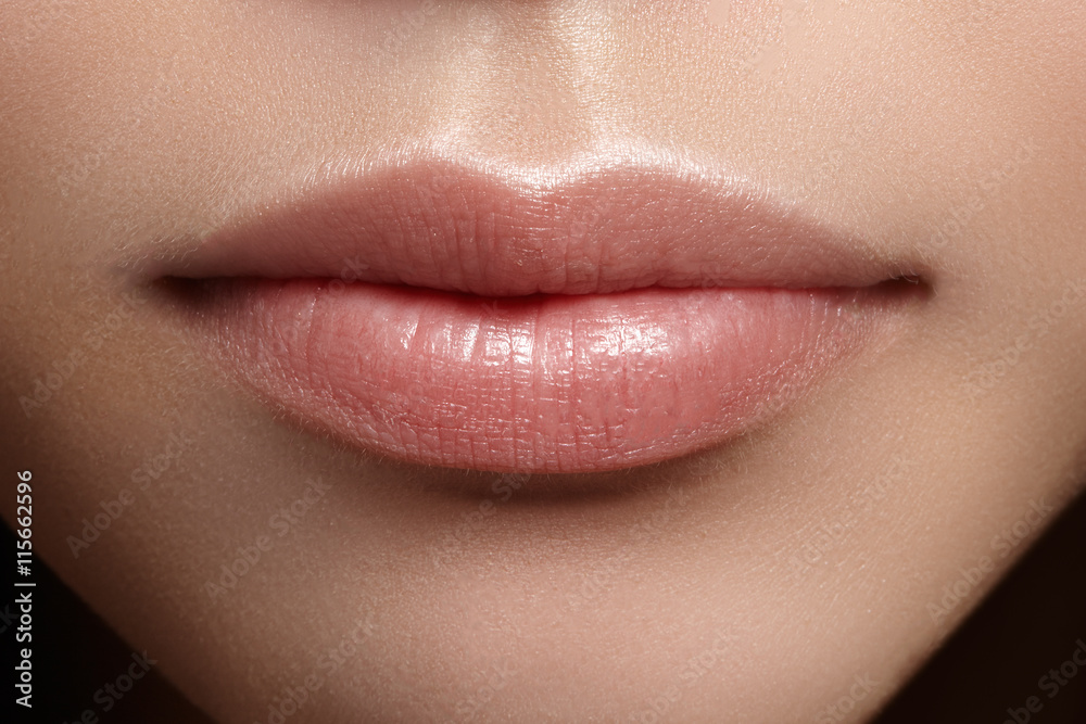 Perfect natural lip makeup. Close up macro photo with beautiful female  mouth. Plump full lips. Close-up face detail. Perfect clean skin, light  fresh lip make-up. Beautiful spa tender lip Stock Photo