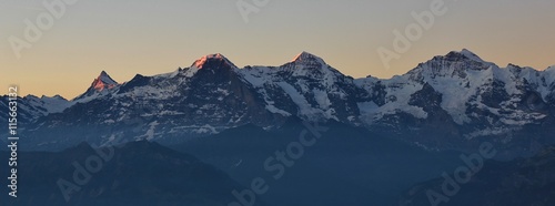 First sunlight on the peaks of Eiger, Monch and Jungfrau