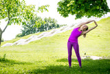 Woman nature portrait doing exercises. Healthy lifestyle