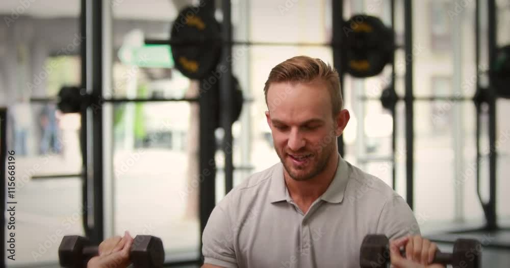 Fit woman lifting dumbbells with trainer in high quality 4k format Fit woman lifting dumbbells with trainer in high quality 4k format