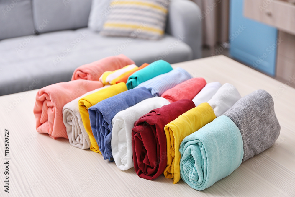 Stack of clothes on table Stack of clothes on table