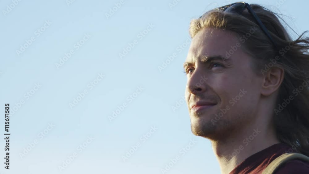 4K Attractive man looking around and content with what he sees, in slow motion 4K Attractive man looking around and content with what he sees, in slow motion