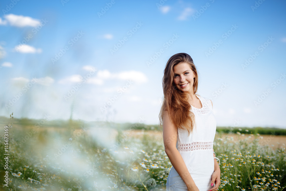 Fototapeta premium Beautiful woman in field