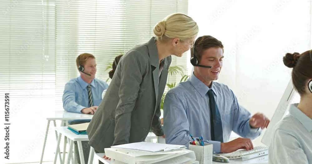 Video of business team working in call center 