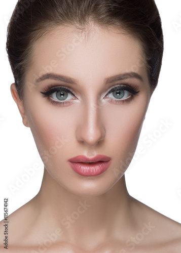 Anti aging treatment and plastic surgery concept. Beautiful young woman with hand on cheek looking at camera  a serene expression in  beauty  skincare concepts. Portrait isolated  white.