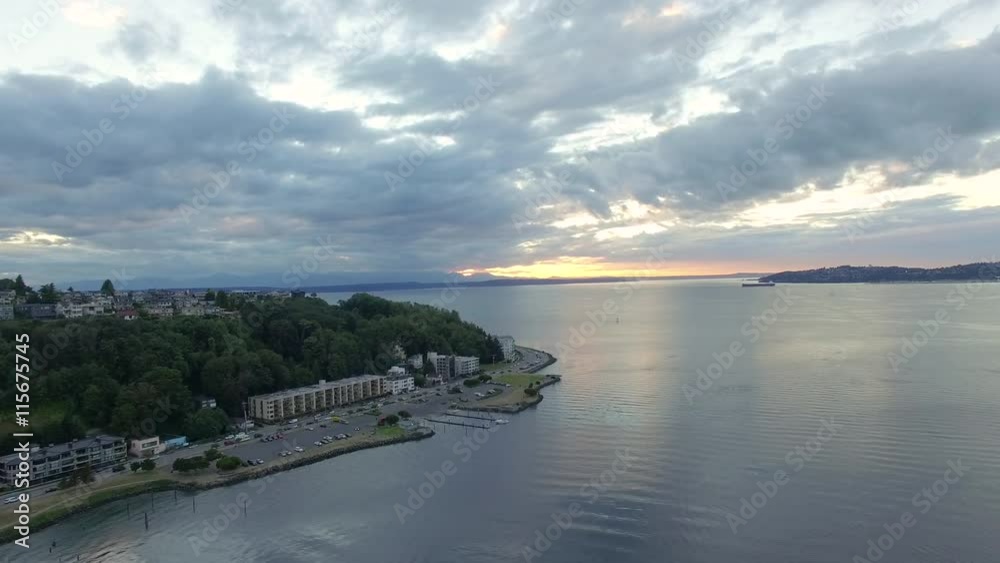 Aerial Sliver of Sunset Looking Past West Seattle and Harbor Ave Washington State USA Aerial Sliver of Sunset Looking Past West Seattle and Harbor Ave Washington State USA